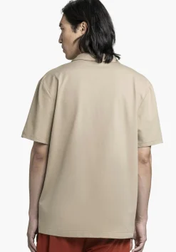Stretch-Polo mit strukturiertem Gewebe